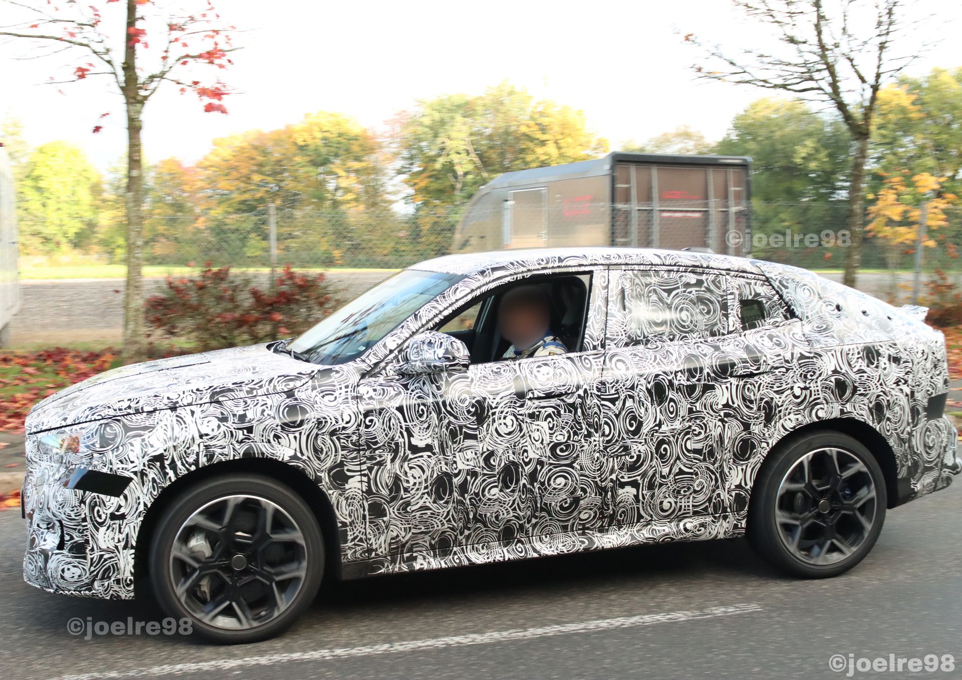 SPIED: BMW iX2 Comes Out of Hiding in Full Camouflage